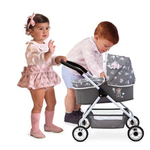 My first pram and top doll